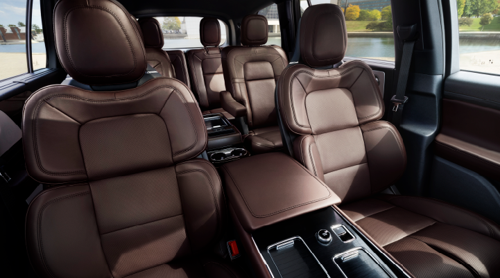 The cabin of the 2025 Lincoln Aviator® SUV is shown with black and brown accents. | Planet Lincoln Love Field in Dallas TX