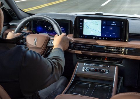 A person is driving a 2025 Lincoln Aviator® SUV from inside the cabin. | Planet Lincoln Love Field in Dallas TX
