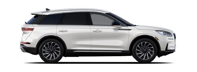 The passenger side of a Lincoln Corsair® SUV is shown in the Ceramic Pearl extra-cost exterior paint option. | Planet Lincoln Love Field in Dallas TX