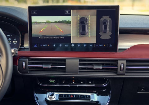 The driver of a 2024 Lincoln Corsair® SUV is shown selecting the drive mode. | Planet Lincoln Love Field in Dallas TX