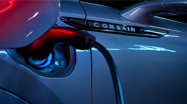 A charger plugged into the charging port of a 2025 Lincoln Corsair® Plug-in Hybrid model. | Planet Lincoln Love Field in Dallas TX
