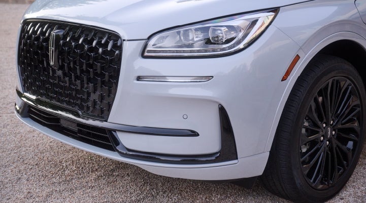 The all-black grille of the available Jet Appearance Package on a 2026 Lincoln Corsair® SUV is shown. | Planet Lincoln Love Field in Dallas TX