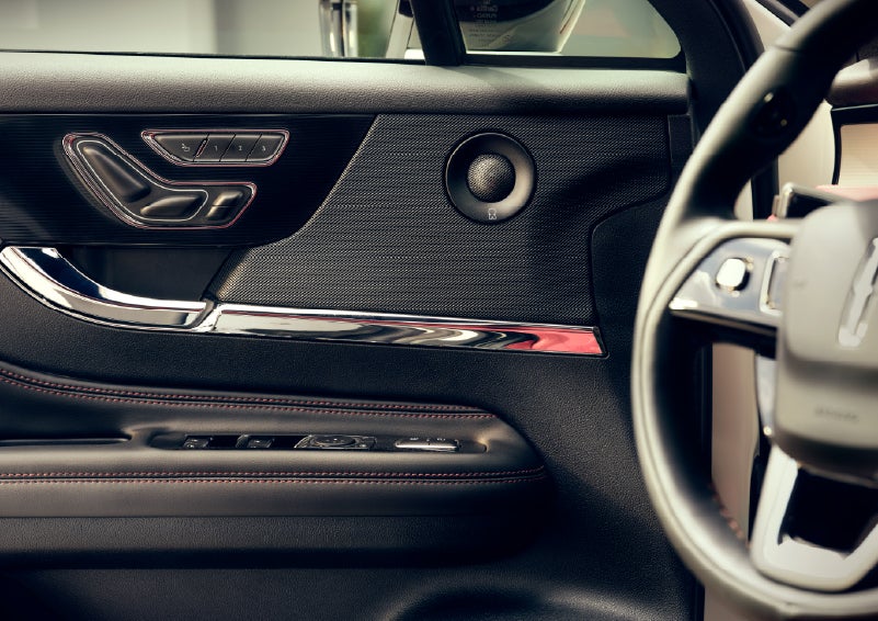 An audio speaker is shown in the driver's side door of a 2026 Lincoln Corsair® SUV | Planet Lincoln Love Field in Dallas TX