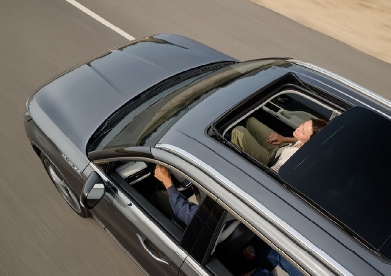 The available panoramic Vista Roof® of a 2027 Lincoln Aviator® SUV is open. | Planet Lincoln Love Field in Dallas TX